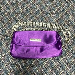 Like new Younique clutch style bag with optional shoulder strap purple
